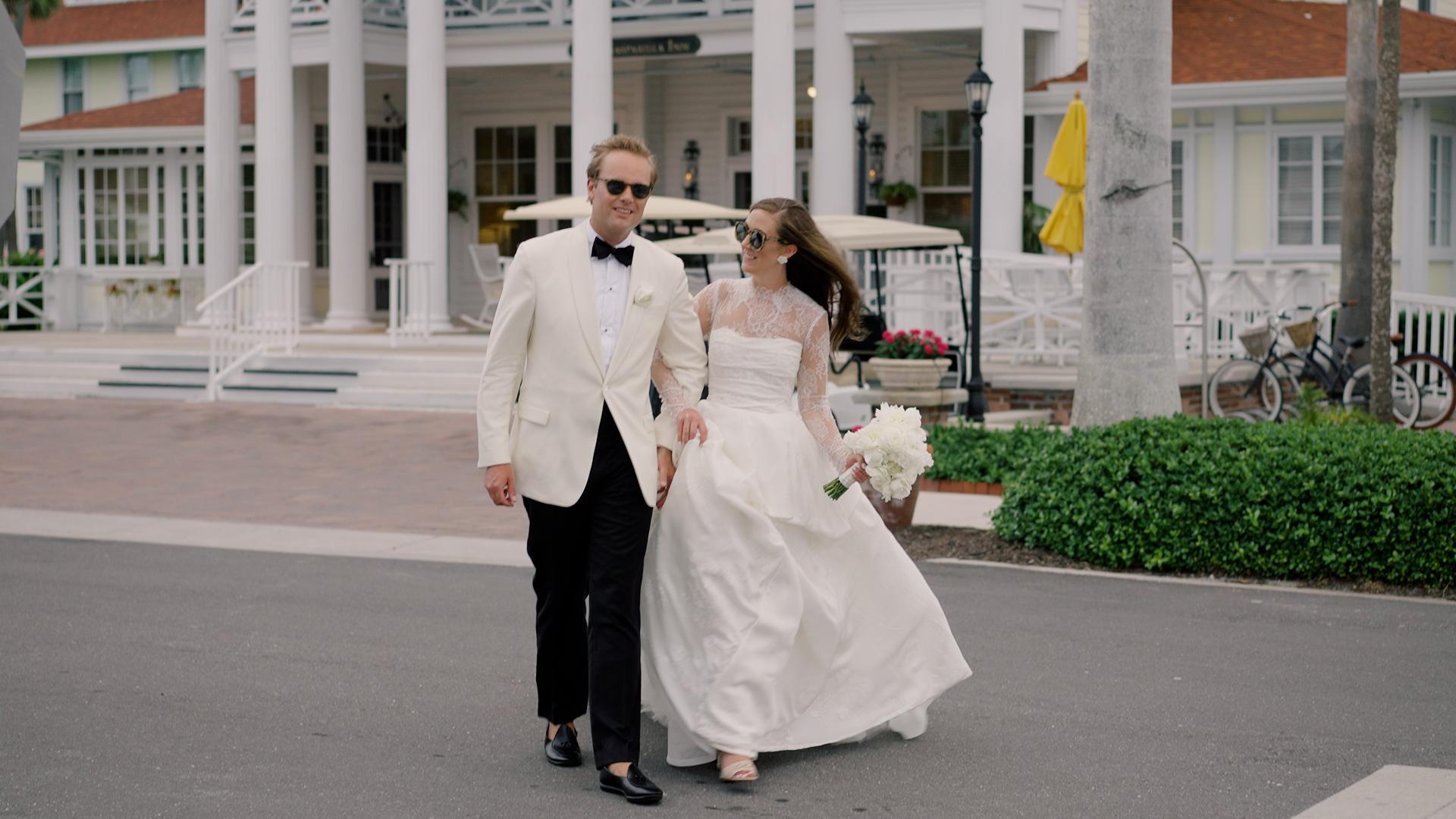 A classic and chic bride and groom in front of the Gasparilla Inn